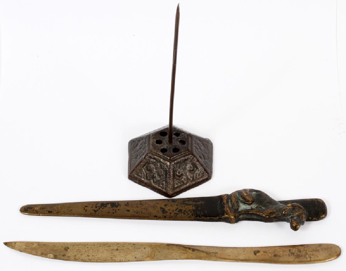 AUSTRIAN BRONZE, PAGE-TURNER, OPENER, SPINDLE: AUSTRIAN BRONZE DOG, PAGE-TURNER, LETTER OPENER, AND LETTER SPINDLE, THREE PCS., L 9" - 9 1/2" Includes a bronze dog shaped page-turner, L.9", a letter opener 9 1/2" and a letter spindle. The letter o