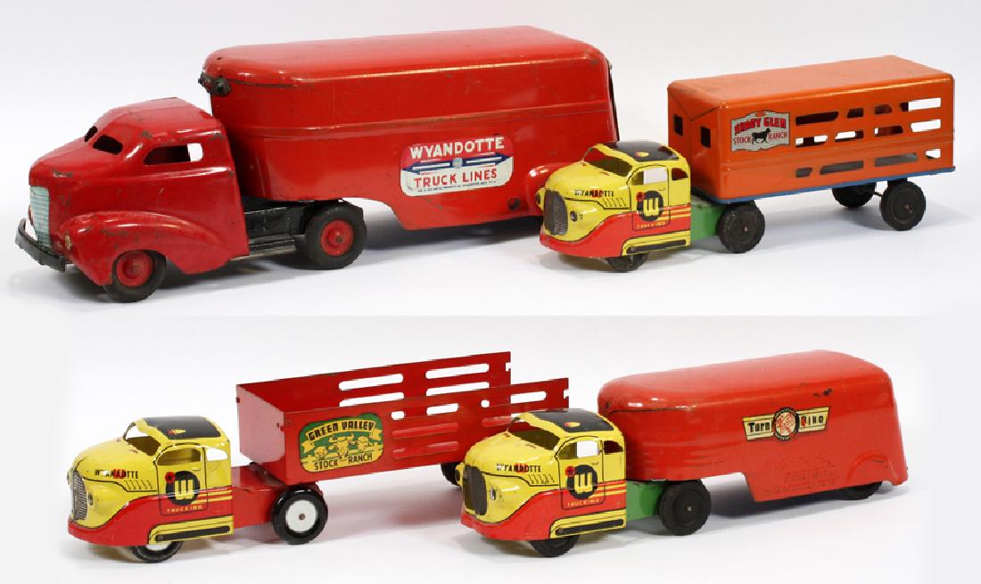 WYANDOTTE TOYS, PRESSED METAL TRUCKS, C1950: WYANDOTTE TOYS, PRESSED METAL TRUCKS, C1950, 4 PCS, L 17" - 24" CATTLE HAULERS AND ENCLOSED TRACTOR TRAILERS Wyandotte Toys pressed metal trucks including two cattle haulers. A "Green Valley Stock Ran