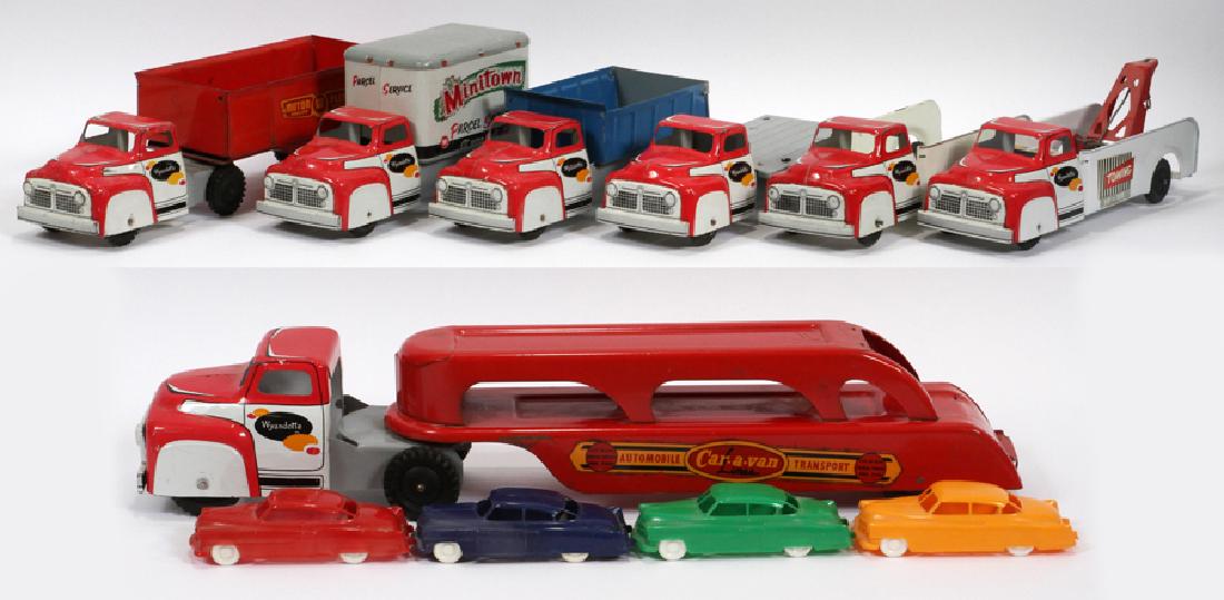 WYANDOTTE TOYS TOY TRUCKS AND AUTOMOBILES. C1952: WYANDOTTE TOYS, PRESSED METAL TOY TRUCKS AND AUTOMOBILES. C1952, 11 PCS., L 12" - 17" CAR HAULER, TOW TRUCK, DUMP TRUCK, ETC. Wyandotte Toys includes a "Car - A - Van Lines Automobile Transport" haule