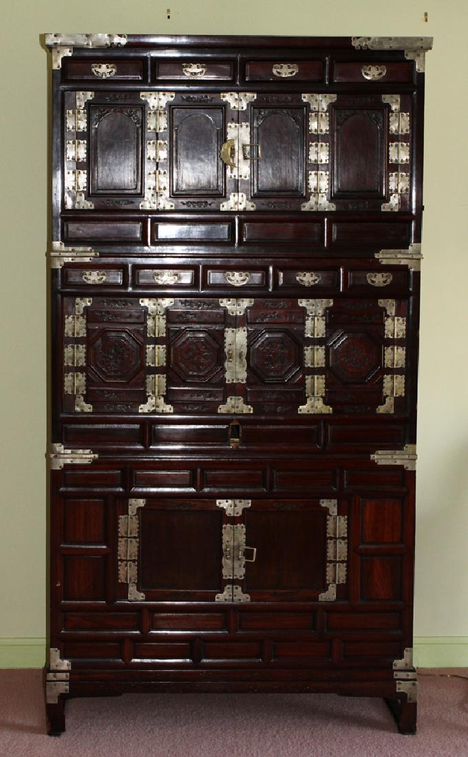 KOREAN, TALL FOUR TIER CABINET H 76" W 41" D 21": KOREAN, TALL FOUR TIER CABINET H 76" W 41" D 21" Mother of pearl inlays. Three cabinets rest on a footed platform base.From the collection of Alfred Glancy, Grosse Pointe Farms.