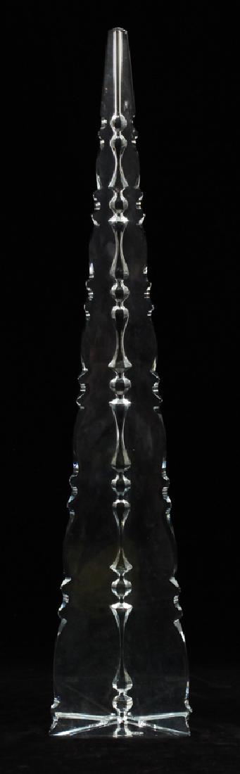 BACCARAT CRYSTAL OBELISK, H 18", DIA 3.5": BACCARAT CRYSTAL OBELISK, H 18", DIA 3.5"An elegant Baccarat crystal obelisk. This piece features notched prism edges and a triangular pyramid form. Having signature branding "Baccarat, France" etched