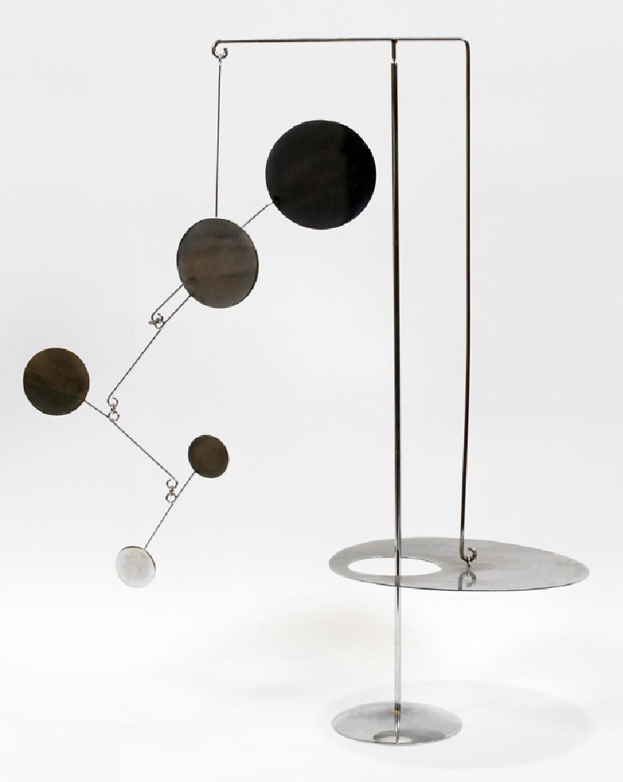 FRANCOIS COLLETTE CHROMED STEEL, MOBILE: FRANCOIS COLLETTE (FRENCH, B. 1936), CHROMED STEEL, MOBILE, TOTAL SIZE: H 25 1/2", W 19", D 9 1/2", UNTITLED Initialed and dated '76 on one of the discs. The sculpture is sold by Galerie Goldmann, Par