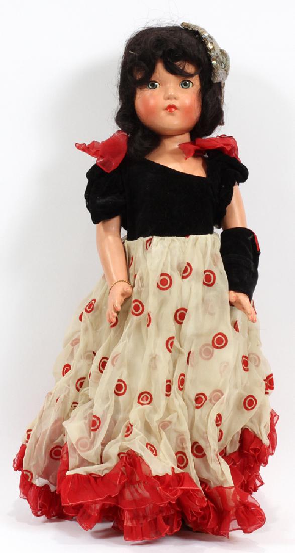 EFFANBEE CHILD'S DOLL, C1950, H 27", W 11", D 5.5": EFFANBEE CHILD'S DOLL, C1950, H 27", W 11", D 5.5":An Effanbee children's doll, circa 1950. This piece offers human hair, stockings and sandals with a velvet top. Having "Effanbee Durable Dolls" impre