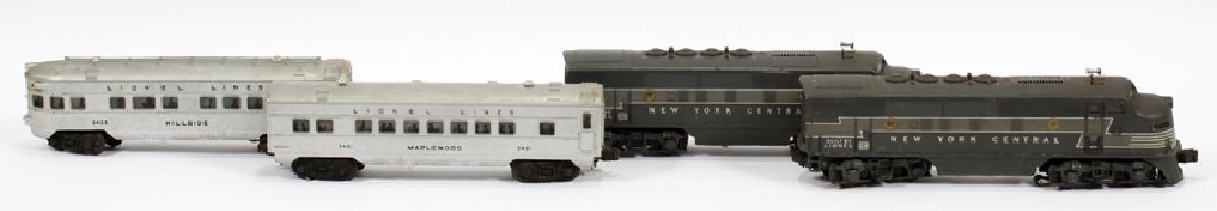 LIONEL TRAIN CARS, 4 PCS, H 3.25", L 13.5": LIONEL TRAIN CARS, 4 PCS, H 3.25", L 13.5":A grouping of four vintage Lionel train cars. This grouping includes model numbers "2354,", New York Central diesel locomotive; "2423" Lionel Hillside Observ