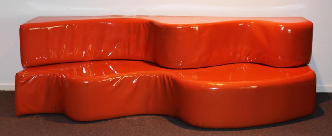 STENDIG MID-CENTURY MODERN COUCH: STENDIG MID-CENTURY MODERN COUCH, H 29", W 93", D 26" :A fantastic mid-century modern couch by Stendig. This orange Italian-made piece has two parts that are encouragingly interchangeable. Features an
