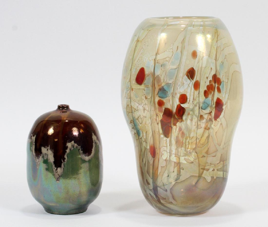 STEINER AND BOSTICK CERAMIC AND GLASS VASES: STEINER AND BOSTICK CERAMIC AND GLASS VASES, TWO H 5", 9" :.Ceramic vase signed C. Steiner H 5". Iridescent purple to green glaze. Also blown glass vase 9" signed Robert William Bostick.