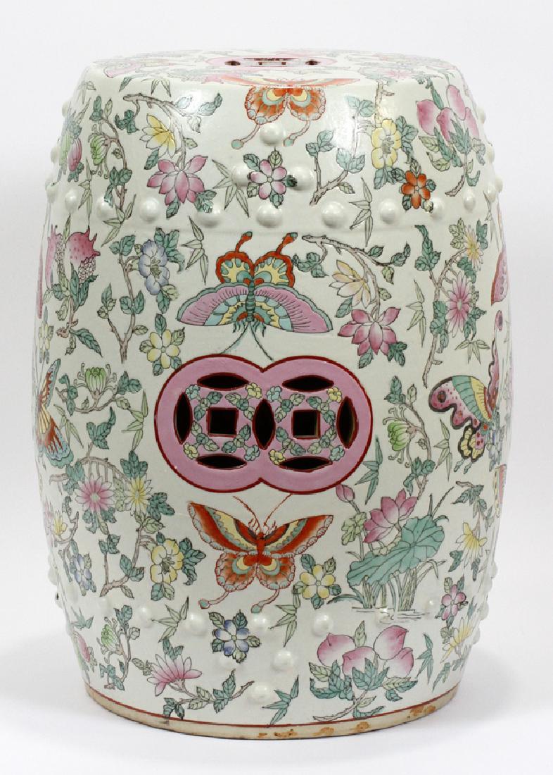 CHINESE, PORCELAIN GARDEN SEAT, H 20": CHINESE, PORCELAIN GARDEN SEAT, H 20" :Drum form, and adorned with flowers, vines and butterflies. Dia 12".