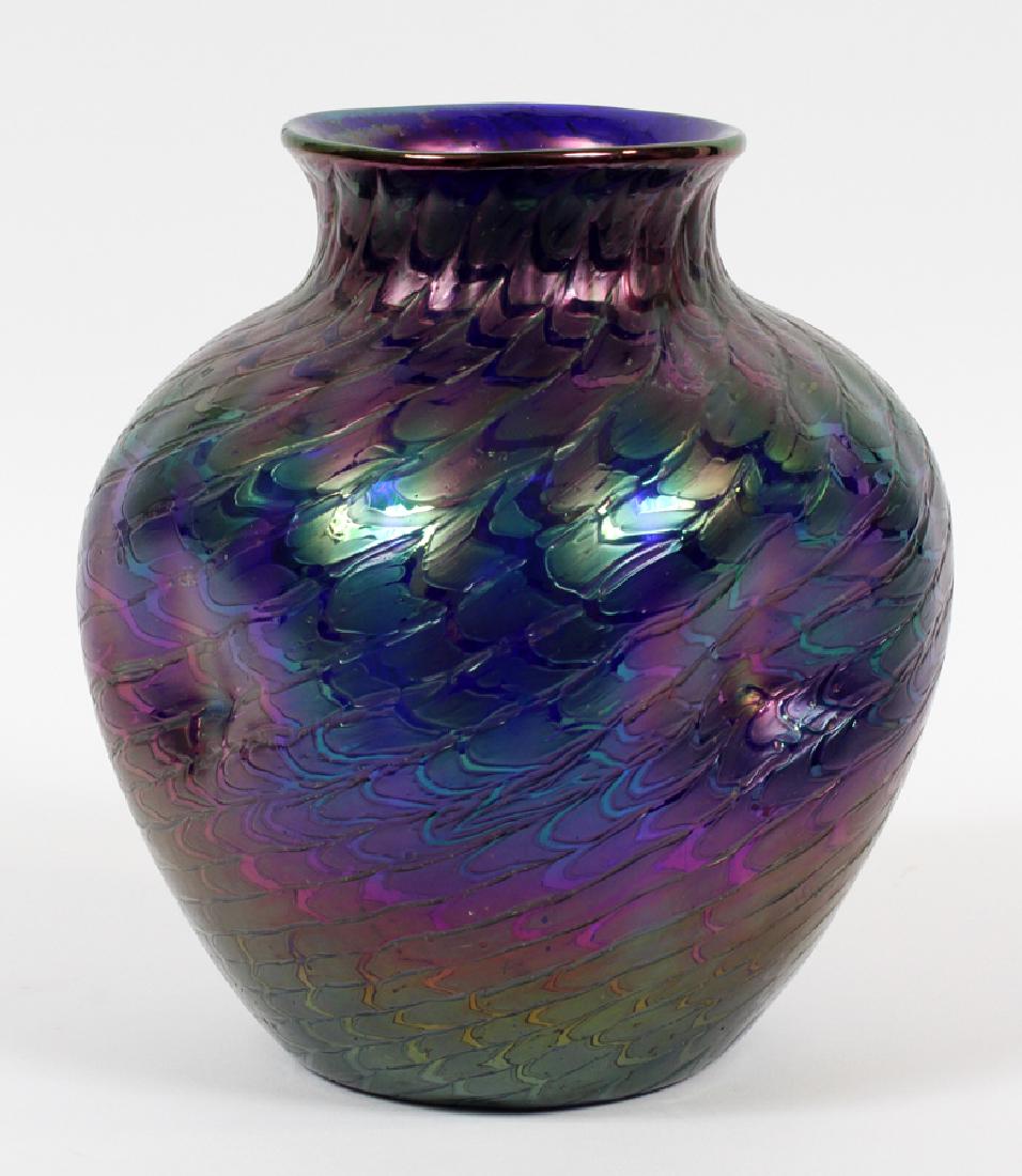AUSTRIAN IRIDESCENT GLASS VASE CIRCA 1900: AUSTRIAN IRIDESCENT GLASS VASE CIRCA 1900 H 9" DIA 7" :Blue - purple. Not signed. Pinched sides, fish scale design.