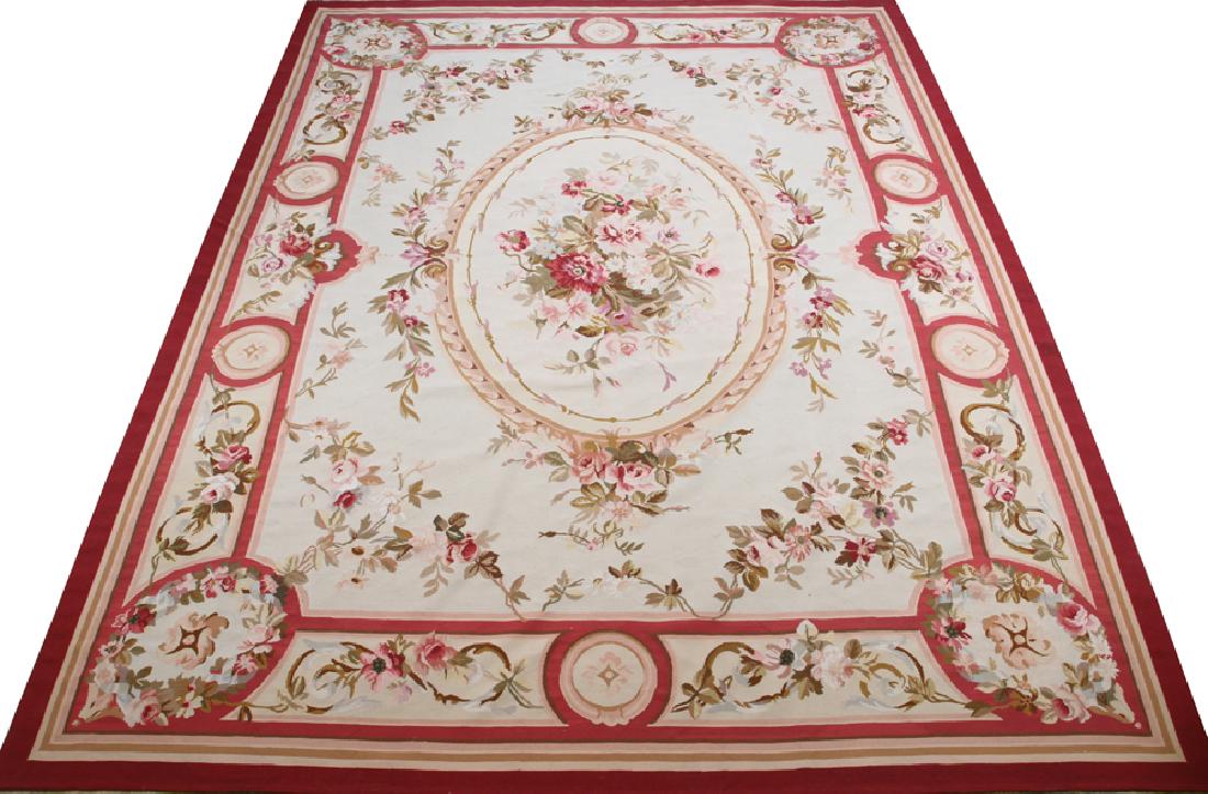 AUBUSSON WOOL, HAND LOOMED CARPET, W 9', L 12': AUBUSSON WOOL, HAND LOOMED CARPET, W 9', L 12' :White ground; floral oval central medallion having sprays surrounding; wide floral border