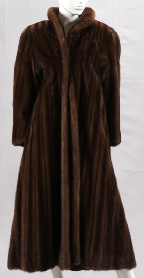 MARGARET RICE MINK FUR COAT: MARGARET RICE MINK FUR COAT, L 49":Full length mink. Bill Blass and Margaret Rice labels. MEM monogram on interior pocket. Approx. size 8/10.