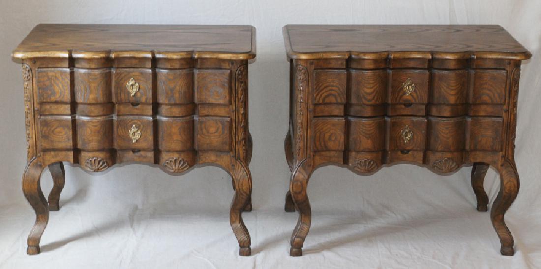 BAKER FURNITURE CO. END TABLES, PAIR: BAKER FURNITURE CO. END TABLES, PAIR, H 25", W 28", D 16" :A pair of Baker Furniture & Co. end tables. Having a scalloped and beveled top each having two drawers with cabriole legs and carved belle fl