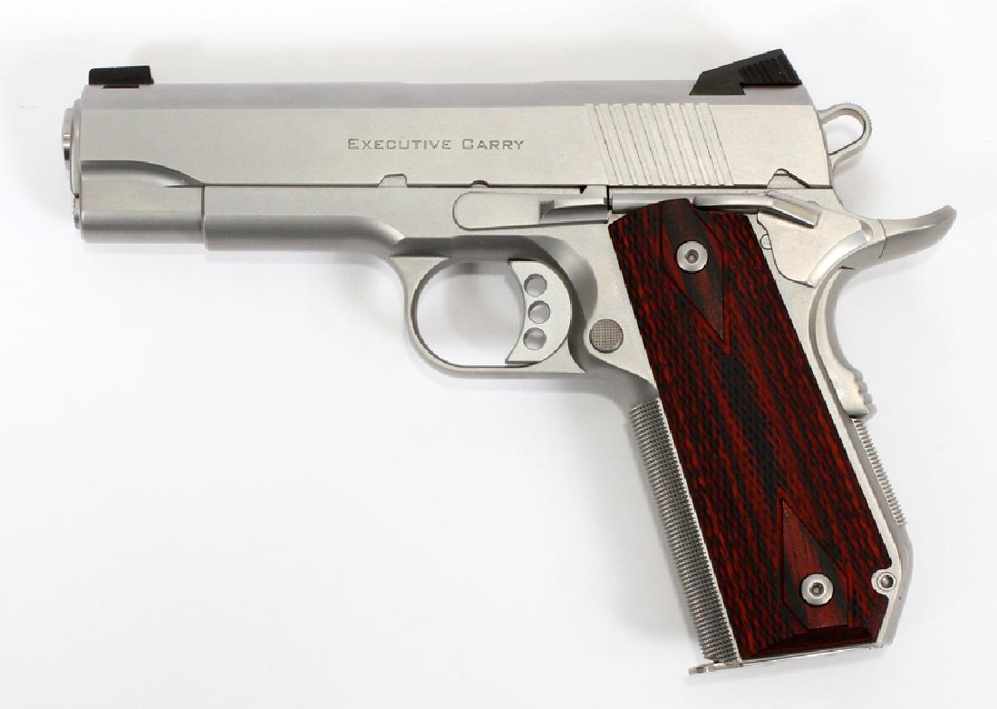 ED BROWN "EXECUTIVE CARRY' 1911 STYLE PISTOL: ED BROWN, "EXECUTIVE CARRY', 1911 STYLE, SEMI-AUTOMATIC PISTOL, .45 CAL., 21 C, L 4" BBL, #17752 :Having stainless steel frame, slide, trigger and hammer, 'Lemon Squeeze' safety on the grip strap. .45