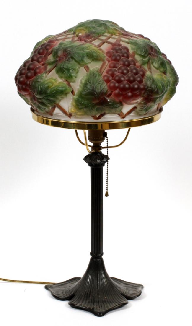PUFFY PAIRPOINT STYLE GLASS SHADE 1910: PUFFY PAIRPOINT STYLE GLASS SHADE: GRAPE BUNCH AND TRELLIS LAMP 1910 :Reverse painted glass shade. Impressed maker on shade rim and date 1910. Base has petal feet and replaced brass frame.
