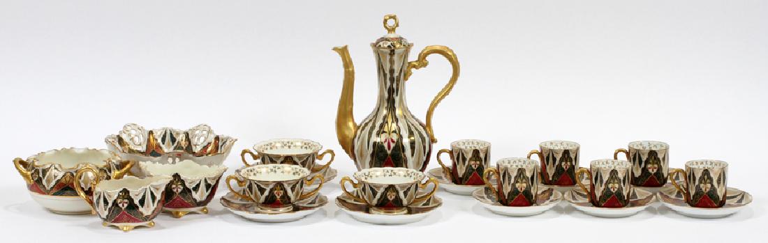AUSTRIAN, ALHAMBRA PATTERN, PORCELAIN TEA SET: AUSTRIAN, ALHAMBRA PATTERN, PORCELAIN TEA SET, 23 PCS :Includes: coffee pot (H 10" x W 4.5" x D 7"), creamer and sugar, 6 cups, 6 saucers, 3 two handled cups, 3 saucers, 2 bowls.
