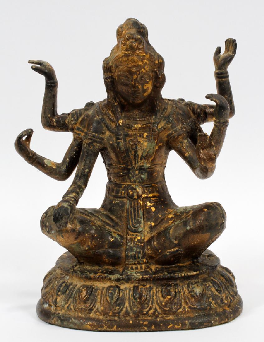 BRONZE BUDDHIST SCULPTURE, H 12", W 8", D 5.5": BRONZE BUDDHIST SCULPTURE, H 12", W 8", D 5.5":A gilded bronze Buddhist sculpture. This piece depicts a seated deity or Bodhisattva with six arms, probably depicting the compassionate Avalokitesvara. 