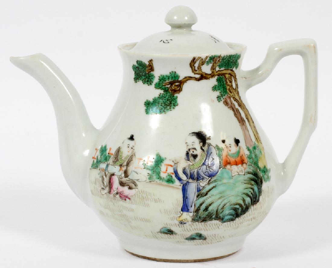 CHINESE HAND PAINTED PORCELAIN TEA POT: CHINESE HAND PAINTED PORCELAIN TEA POT, H 6", W 7" :FIGURES IN LANDSCAPE, SIGNED ON THE UNDERSIDE AND SCRIPT ON SIDE OPPOSITE LANDSCAPE SCENE.