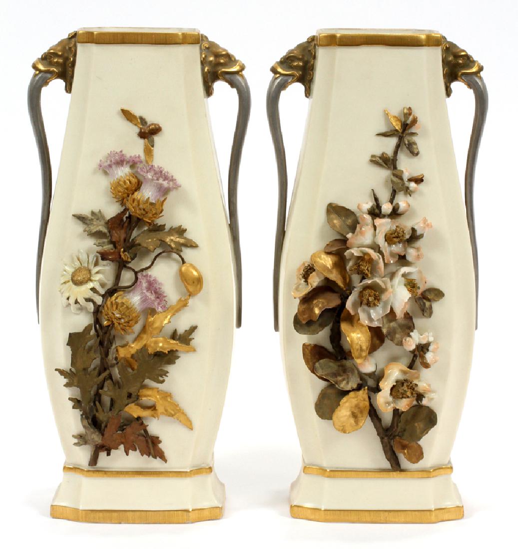 ROYAL WORCESTER, FLORAL MOTIF, BISQUE VASES, PAIR: ROYAL WORCESTER, FLORAL MOTIF, BISQUE VASES, PAIR, H 11", DIA 5" :A pair of bisque porcelain vases decorated with a dimensional floral motif. Stamped with Royal Worcester mark on underside.