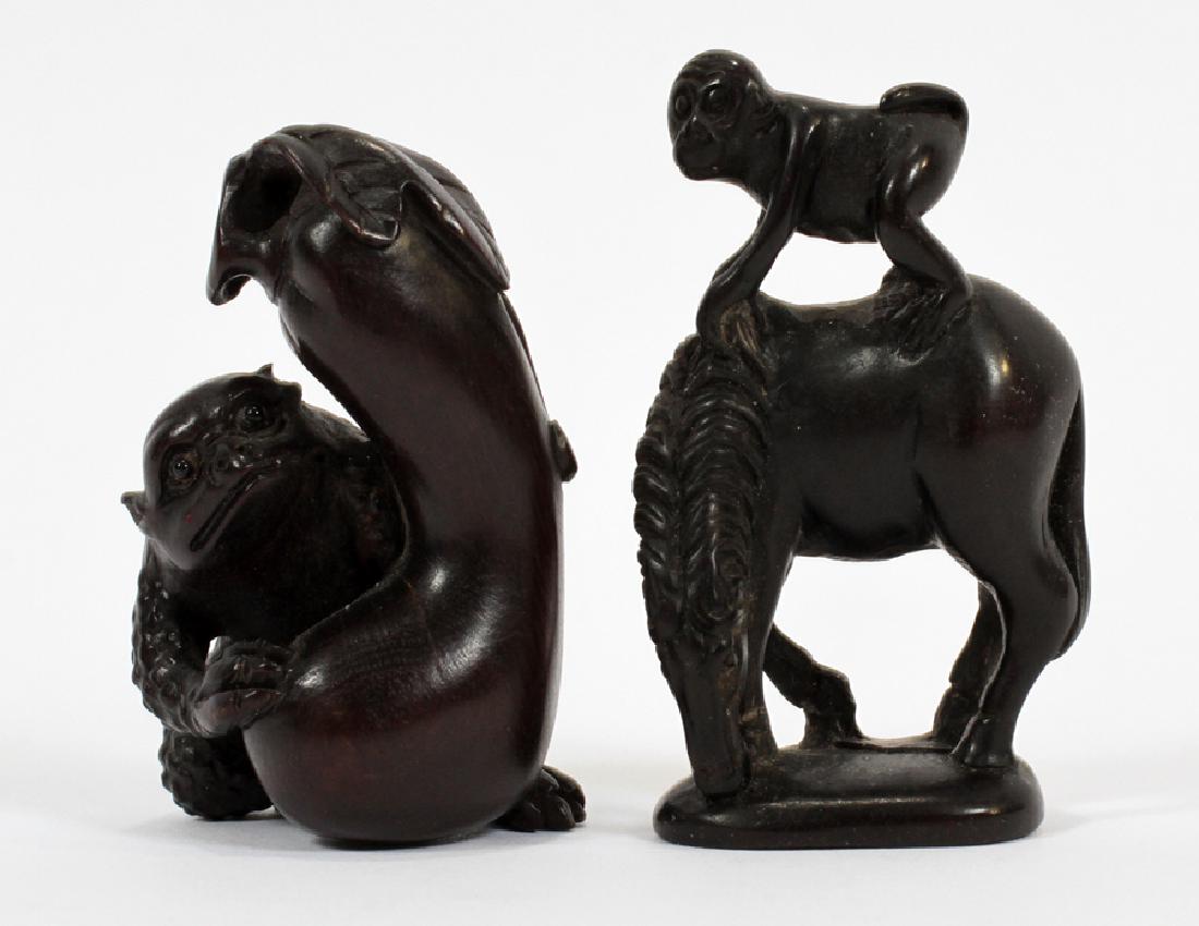 JAPANESE, HAND CARVED, WOODEN NETSUKE: JAPANESE, HAND CARVED, WOODEN NETSUKE, 2, H 2" & 2.25" :Two hand-carved wooden netsukes. The first depicts a frog holding a large gourd and is signed. The second depicts a monkey riding a horse that h