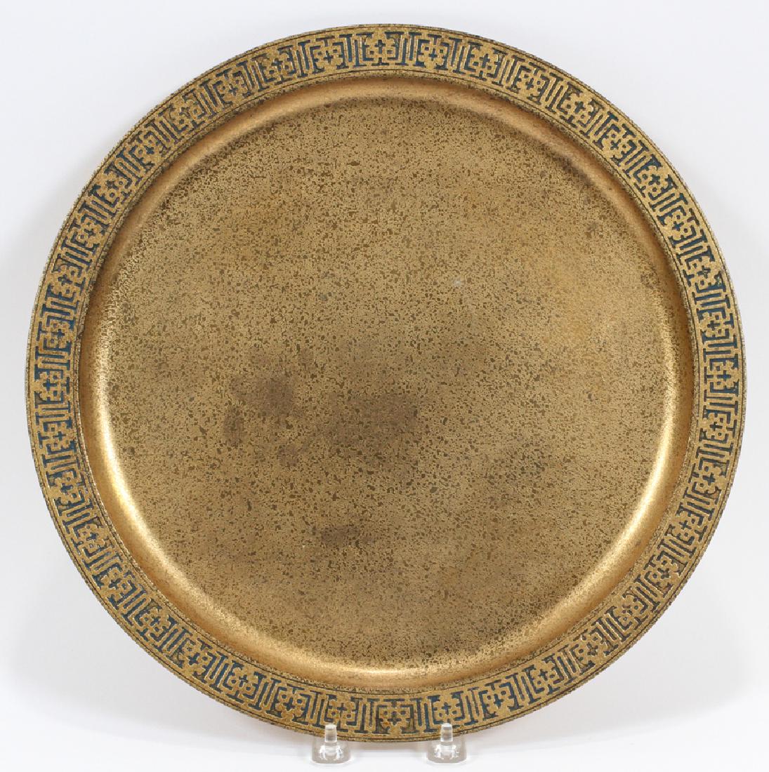TIFFANY STUDIOS NEW YORK BRONZE DORE CHARGER: TIFFANY STUDIOS NEW YORK BRONZE DORE CHARGER, #1747, CA. 1910, DIA 14":A Tiffany Studios New York dore bronze charger. Signature branding and pattern (#1747) impressed to the underside.
