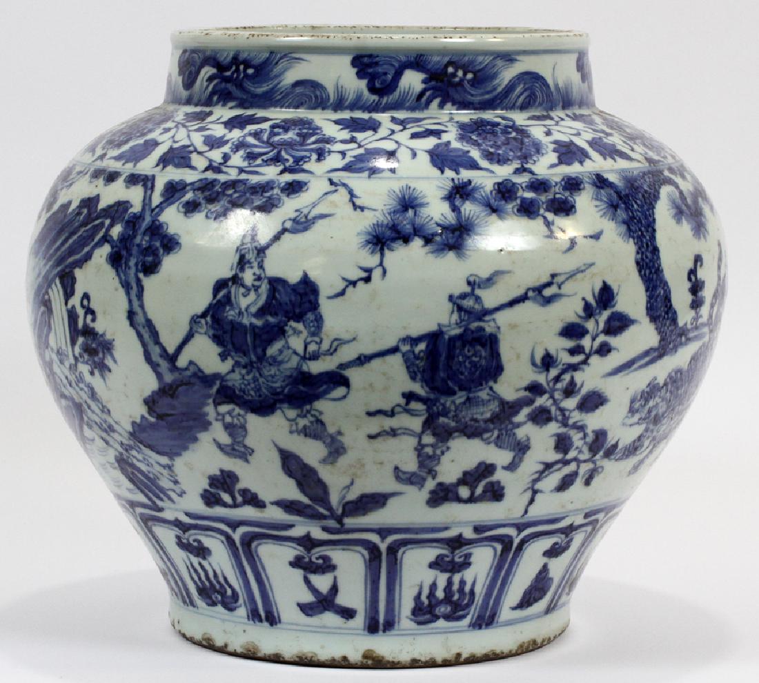 CHINESE BLUE WHITE PORCELAIN JARDINIERE: CHINESE BLUE WHITE PORCELAIN JARDINIERE, H 12.25", DIA 13" :Depicting an outdoor scene with a man in a cart pulled by lions, two warriors riding horses, two soldiers on foot with pine and peach trees