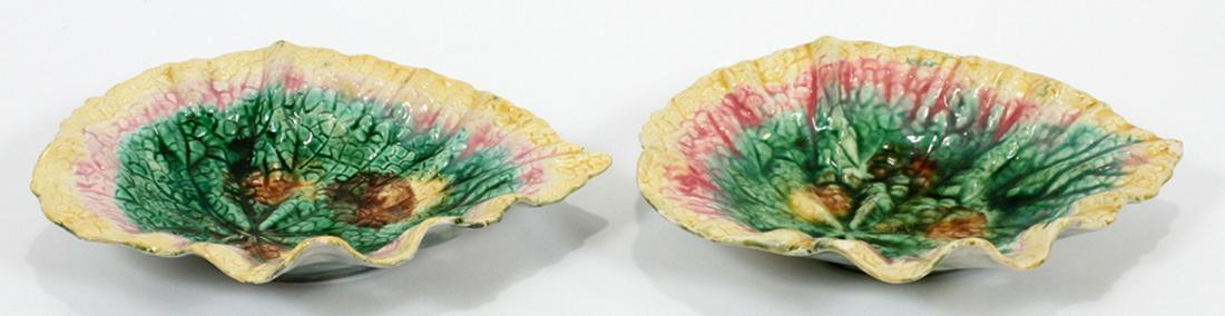 GRIFFEN, SMITH & HILL MAJOLICA PLATES, BEGONIA LEAVES: GRIFFEN, SMITH & HILL MAJOLICA PLATES, 19TH C., PAIR, H 2", W 9.5", D 7", BEGONIA LEAVES :A pair of Griffen, Smith & Hill earthenware majolica plates, dating to the late 19th century. Each depicts a p