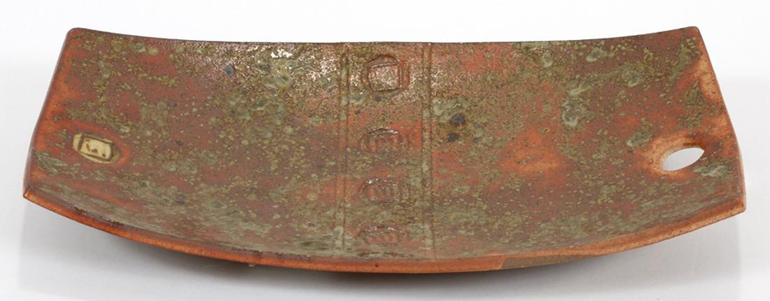 CERAMIC CENTERPIECE, H 15.25", W 9", D 2.5": CERAMIC CENTERPIECE, H 15.25", W 9", D 2.5":A slab constructed ceramic centerpiece. Depicting primitive embossed forms accented with a green splattered glaze. Previously purchased at Pewabic Pottery. 