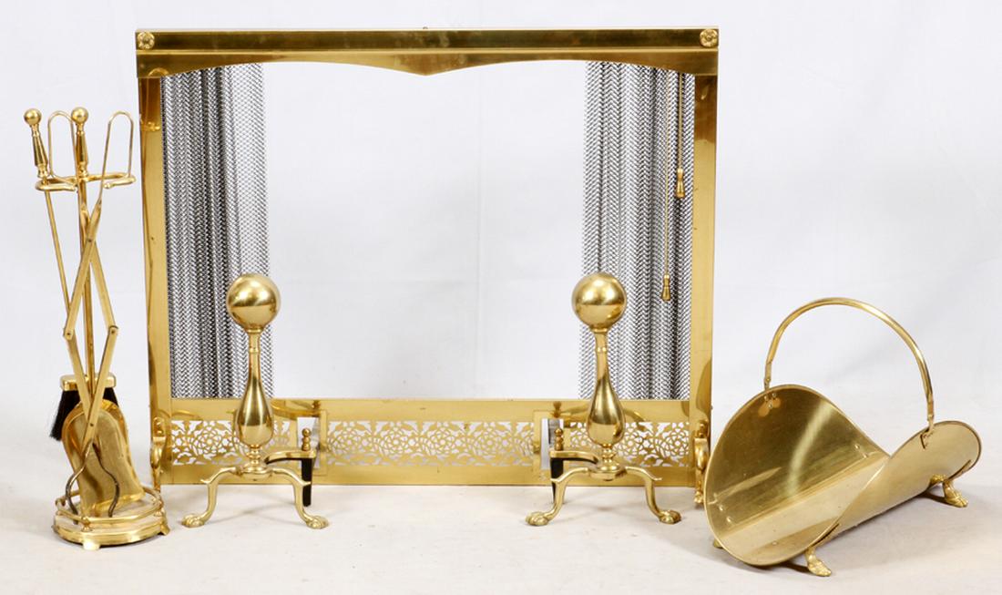 BRASS FIREPLACE SET, 20TH C., 4 PCS.: BRASS FIREPLACE SET, 20TH C., 4 PCS.:INCLUDING FIRESCREEN, ANDIRONS, FIRE TOOLS, AND A FIREWOOD BASKET. THE FIRE TOOLS INCLUDE tONGS, A BROOM, AND A SHOVEL.