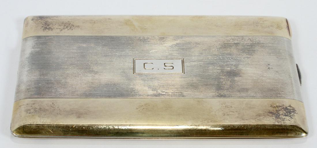 CARTIER STERLING CIGARETTE CASE: CARTIER STERLING CIGARETTE CASE WITH 14KT GOLD PLATED INTERIOR, C. 1937, W 3 1/8", L 5 1/8":Initialed "CS" on outside of case; inscribed on the interior, "lga and Sidney to Clarence Steinmetz April 19