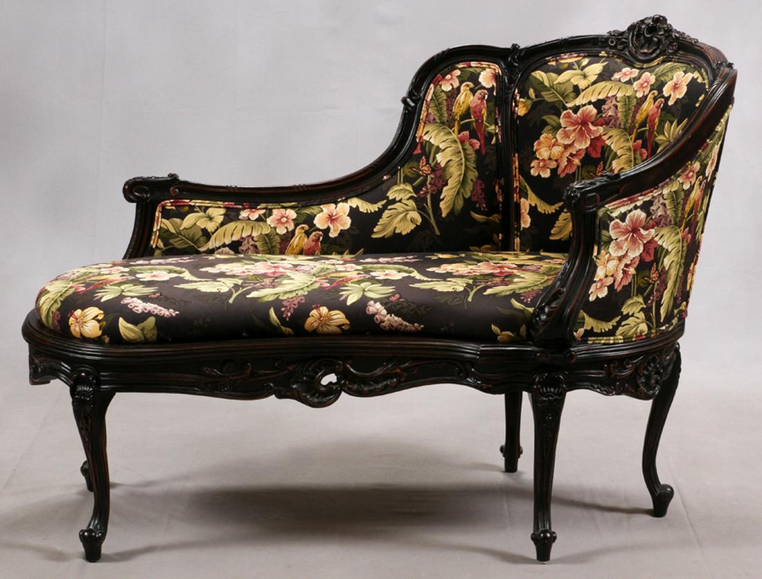 LOUIS XV STYLE CARVED WALNUT CHAISE LOUNGE: LOUIS XV STYLE CARVED WALNUT CHAISE LOUNGE, H 39", W 28", L 57" :Carved scrolling leaf and floral design. Bird, butterfly, and floral upholstery.