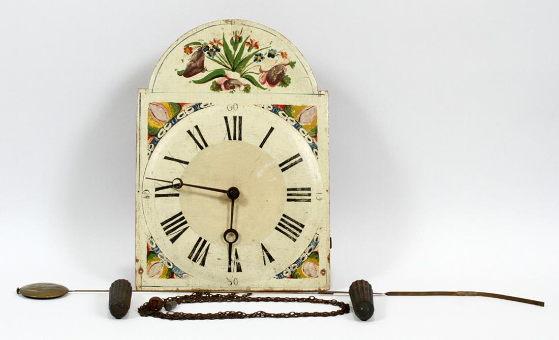 WAG-ON-THE-WALL PAINTED WOOD AND BRASS WALL CLOCK: WAG-ON-THE-WALL, PAINTED WOOD AND BRASS, WALL CLOCK, C19TH C, H 40", W 12" :Having a painted wood face with Roman numerals, and open brass pendulum. Two time and strike weights.
