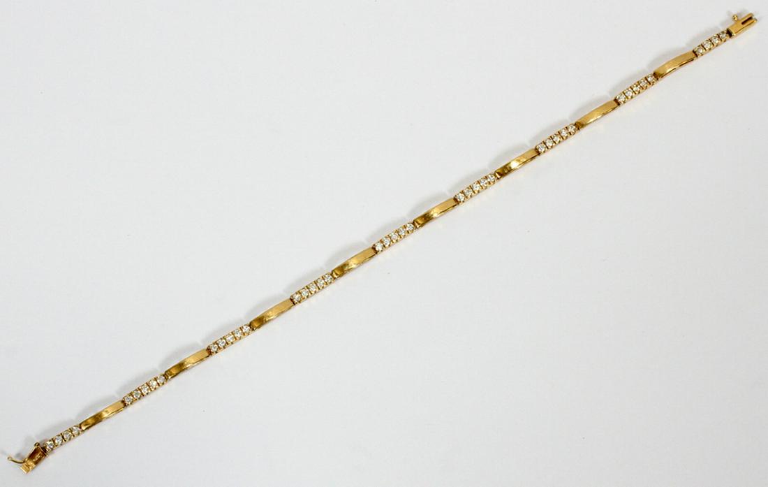 MEXICAN, 14KT YELLOW GOLD & DIAMOND BRACELET: MEXICAN, 14KT YELLOW GOLD & DIAMOND BRACELET, L 8", T.W. 6 GR :A Mexican 14kt yellow gold and diamond bracelet. Total weight: 6 grams.