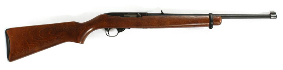RUGER MODEL 10/22, SEMI-AUTOMATIC .22 LR RIFLE: RUGER MODEL 10/22, SEMI-AUTOMATIC .22 LR RIFLE, L 18 1/2" BBL, 124-29510 :Having a blued finish, 18 1/2" barrel, one-piece walnut stock, iron sights. 10 round removable box magazine not included. Seri