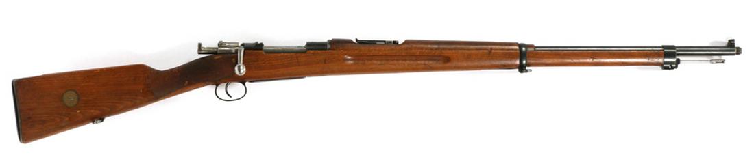 CARL GUSTAFS SWEDISH MAUSER MODEL 1900: CARL GUSTAFS, SWEDISH MAUSER, MODEL 1900, STADS GEVARSFAKTORL, 6.5X55 MM CAL., L 29" BBL, 65484 :Having a bolt action, full-length walnut stock, and hand protector, cleaning rod, and sliding ramp rear