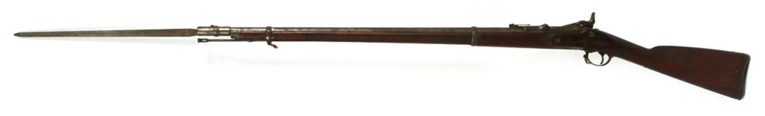 U.S. SPRINGFIELD MODEL 1870 TRAP DOOR RIFLE: U.S. SPRINGFIELD, MODEL 1870 TRAP DOOR, .50 CAL. RIFLE AND BAYONET, C1870, L 32 1/2", 52" O/A :Having a full-length walnut stock, 32 1/2" barrel and an overall length of 52". Marked with the U.S. Armo