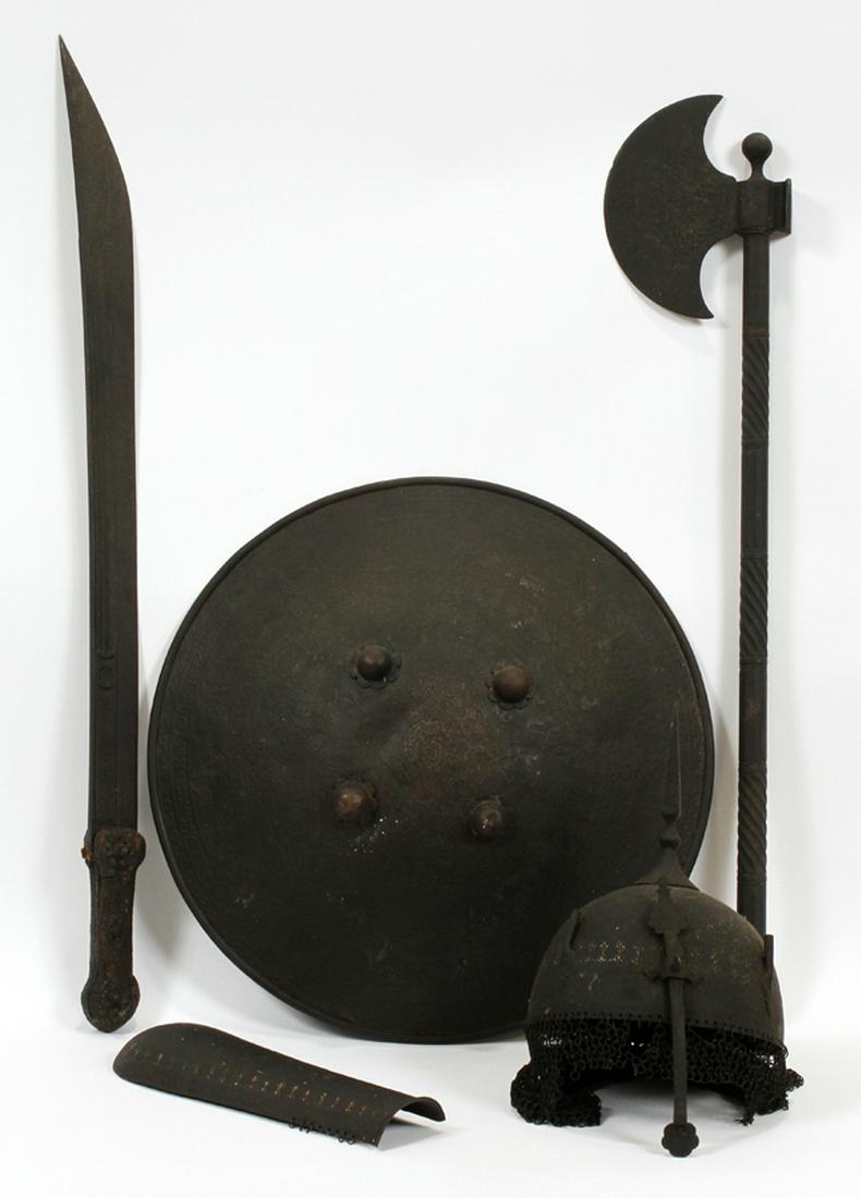 PERSIAN GOLD INLAY, METAL ARMOR 5 L 32" DIA 18": PERSIAN GOLD INLAY, METAL ARMOR 5 L 32" DIA 18" :Five Persian armor items, including a battle axe measuring 31" long, a sword measuring 31.5" long, a bazuband measuring 12" long, a shield with an 18" 