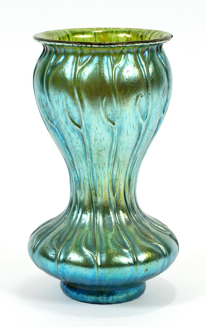 AFTER LOETZ AUSTRIA ART NOUVEAU INFLUENCE GLASS VASE: AFTER LOETZ AUSTRIA ART NOUVEAU INFLUENCE ART GLASS VASE H 7" :After Loetz Art Nouveau influence iridescent blue art glass vase.