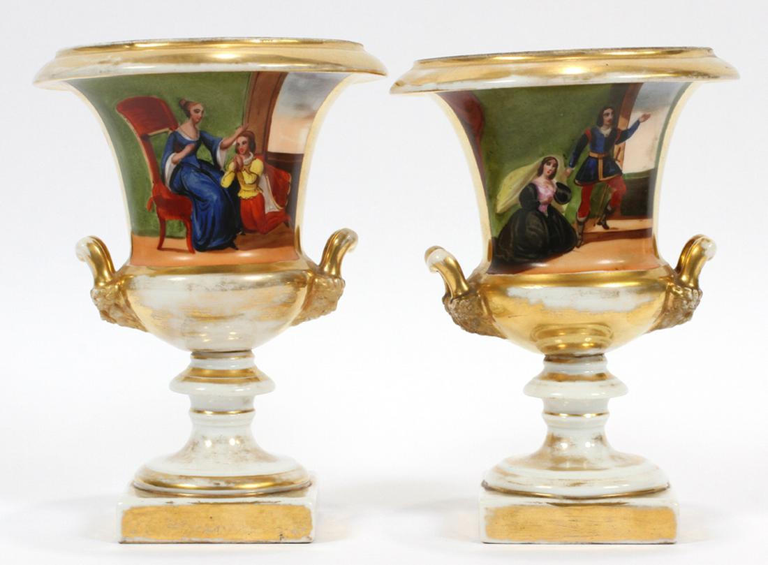JACQUES PETIT, FRENCH PORCELAIN MANTLE URNS: JACQUES PETIT, FRENCH PORCELAIN MANTLE URNS, CIRCA 1820, PAIR, H 8", DIA 6.25":A pair of hand-painted French porcelain urns. Each offers hand-painted scenes of provincial life accented with gold trim.