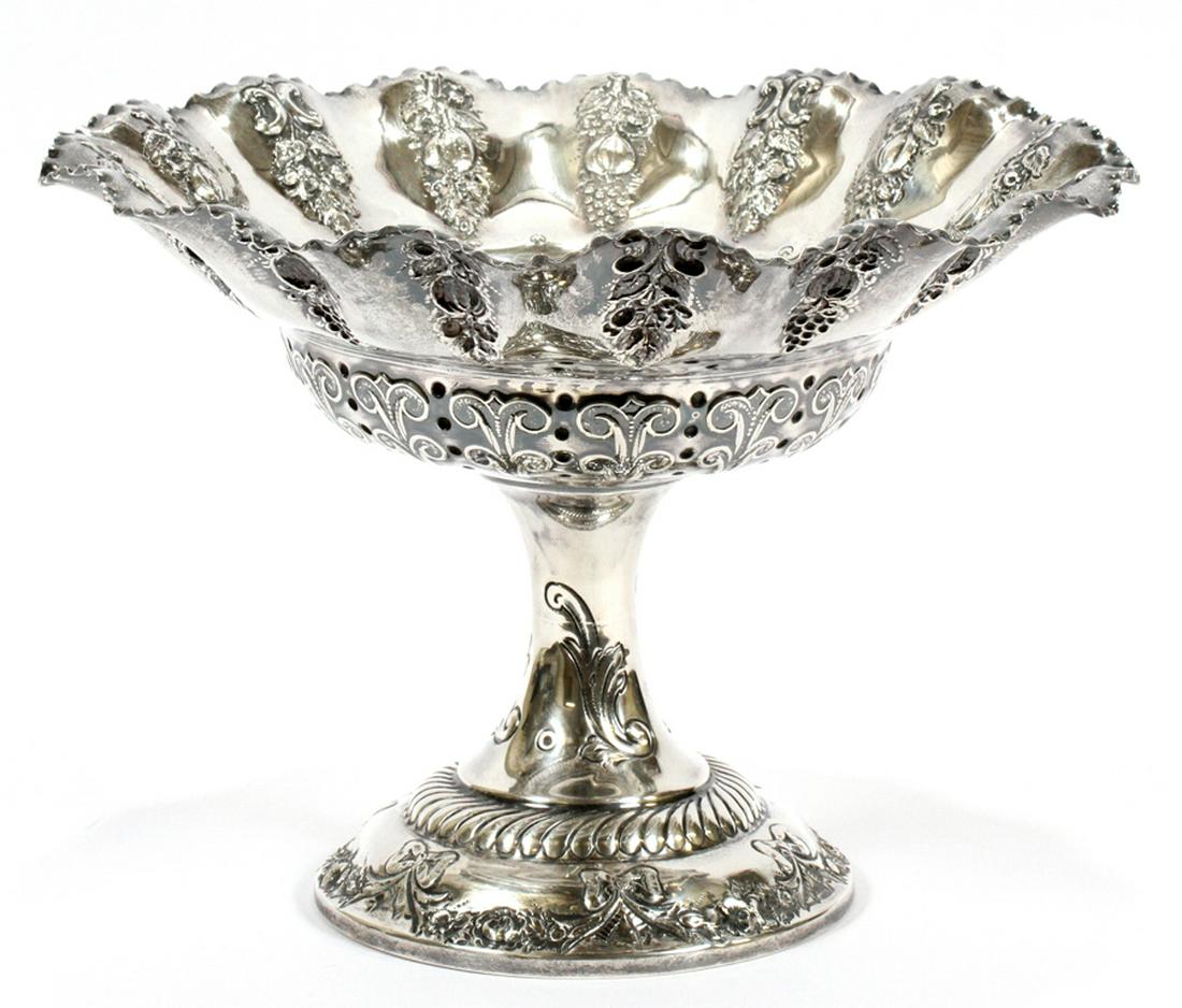 MAPPIN & WEBB HOLLOW WARE STERLING, COMPOTE: MAPPIN & WEBB ENGLAND HOLLOW WARE STERLING, COMPOTE H 7.5" DIA 10.5" :A sterling hollow ware compote from the vaunted English firm of Mappin & Webb. Having an elaborately embossed repetitious foliate