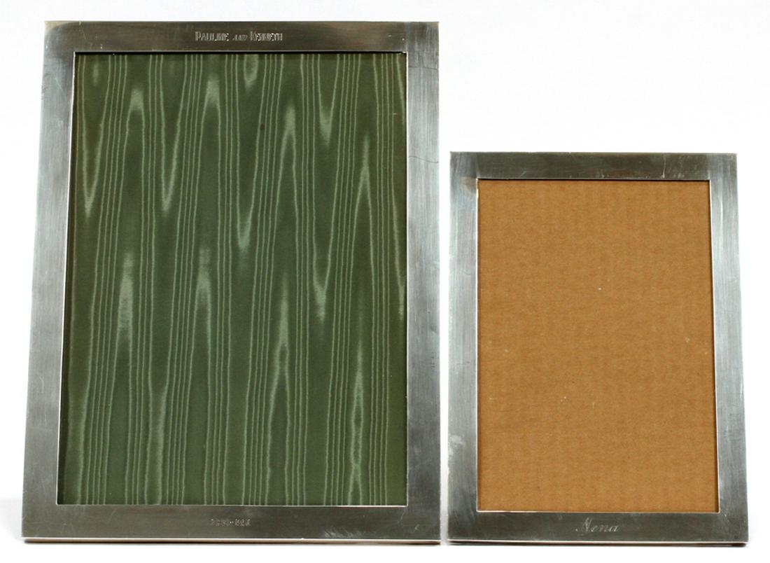 STERLING SILVER PHOTO FRAMES, 2 H 6", 12": STERLING SILVER PHOTO FRAMES, 2 H 6", 12" :Includes two frames, with dimensions of 12" x 9 1/2" and H 6.7" x W 9". Both engraved.