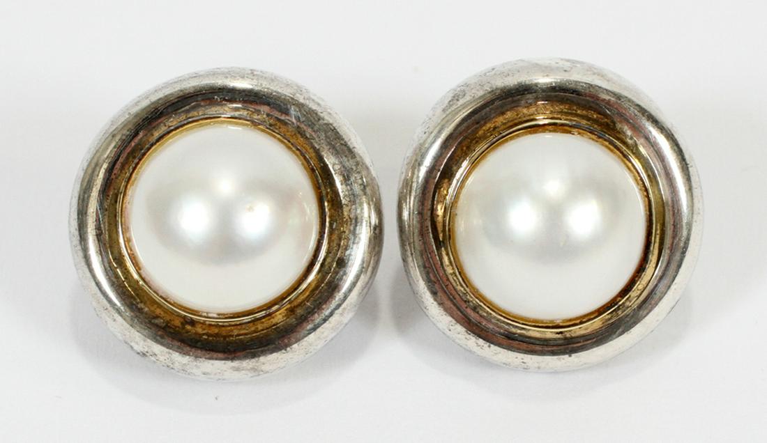 PICASSO TIFFANY&CO. PEARL & STERLING EARRINGS: PALOMA PICASSO, TIFFANY & CO. PEARL & STERLING SILVER CLIP EARRINGS, DIA .75", T.W. 15 GR :A pair of Paloma Picasso for Tiffany & Co. sterling silver and pearl clip earrings. Total weight: 15 grams. E
