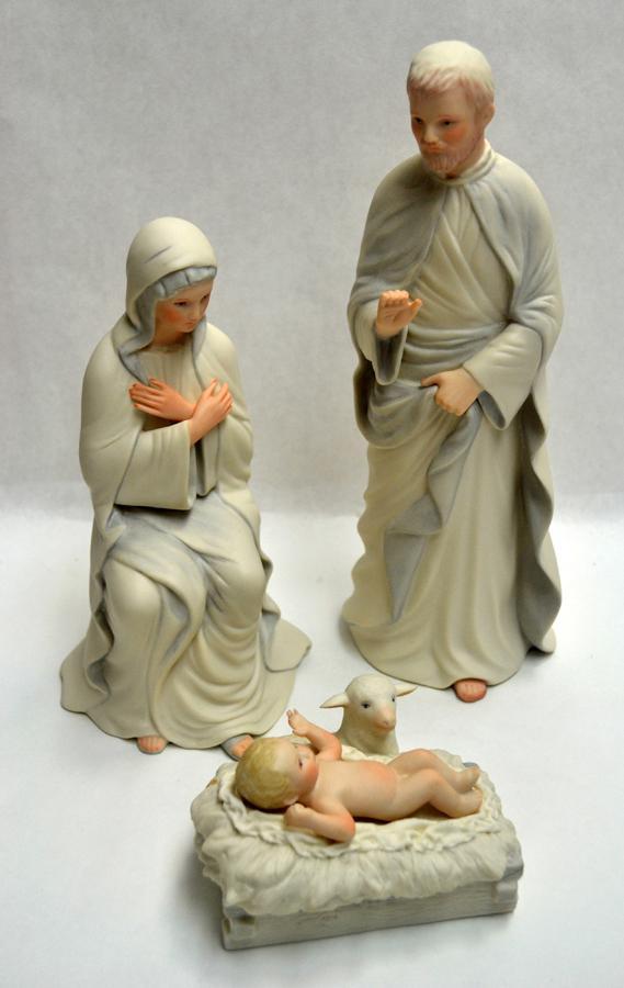 CYBIS, BISQUE PORCELAIN, NATIVITY SET: CYBIS, BISQUE PORCELAIN, NATIVITY SET (CLOSED EDITION), 1982, 3 PCS., H 2" - 10" :Depicts the Christ Child in a manger, a seated Mary and Joseph standing. Three pieces. Marked 'Cybis USA' on the under