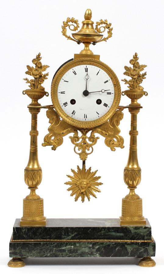 LOUIS XVI STYLE DORE BRONZE MANTEL CLOCK: LOUIS XVI STYLE DORE BRONZE MANTEL CLOCK, H 17.25", W 9.5", D 3.5":A French Louis XVI style dore bronze mantel clock. Features a dore bronze case, ormolu mounts and roman numerals to the dial. Include