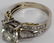 ROUND DIAMOND, SIDE DIAMONDS GOLD RING - 3