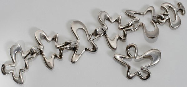 GEORG JENSEN SILVER BRACELET & BROOCH: GEORG JENSEN STERLING SILVER BRACELET & BROOCH DESIGNED BY HENNING KOPPEL, POST 1945:7" link style bracelet with toggle clasp. Two pieces. Impressed Georg Jensen and Sterling also Denmark and maker's