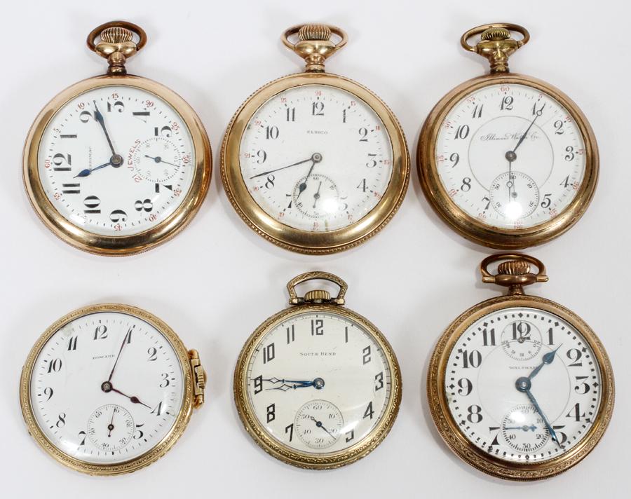 ILLINOIS, MERRIMAC, WALTHAM, ETC, POCKET WATCHES: ILLINOIS, MERRIMAC, WALTHAM, ETC, OPEN FACE GOLD FILLED AND PLATED POCKET WATCHES, C1900 6 PCS., DIA 1 1/2" - 1 5/8" Open face pocket watches one marked 'Elbico' and 'Kingston Guaranteed' inside of th