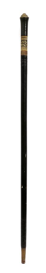 VICTORIAN EBONIZED WOOD SWORD CANE 19TH C. L 26": VICTORIAN EBONIZED WOOD SWORD CANE 19TH C. L 26" Having a lion mask finial. Measuring 36" overall, with a carved bone decorative band.