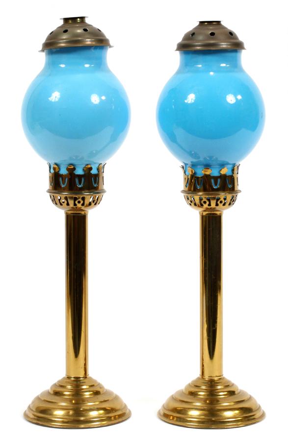 PAIR OPALINE GLASS, BRASS CANDLESTICK LAMPS: PAIR OPALINE GLASS, BRASS CANDLESTICK LAMPS 19 TH C, H 16", DIA 4.5" A pair of blue opaline glass kerosene peg lamps.