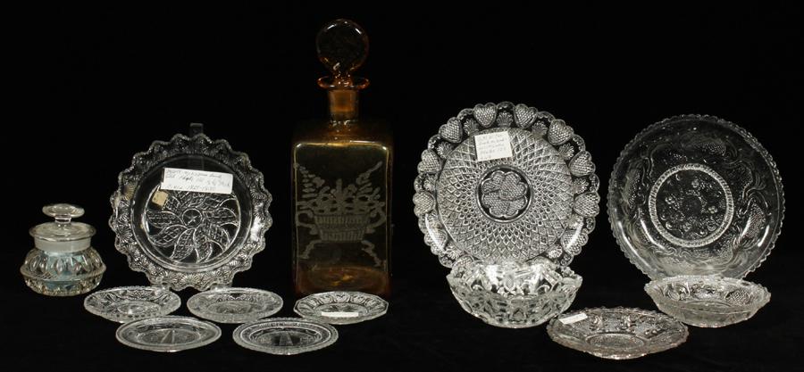 ANTIQUE, FLINT PLATES AND AMBER GLASS DECANTER: ANTIQUE, FLINT PLATES AND AMBER GLASS DECANTER, 19TH CENTURY, 13 PCS. The flint glass 'Lacey' pieces include; 3 plates, Dia. 5" - 6.5"; 5 butter plates , Dia. 3.25"; 3 bowls, Dia. 4.5" - 6.5". One ant