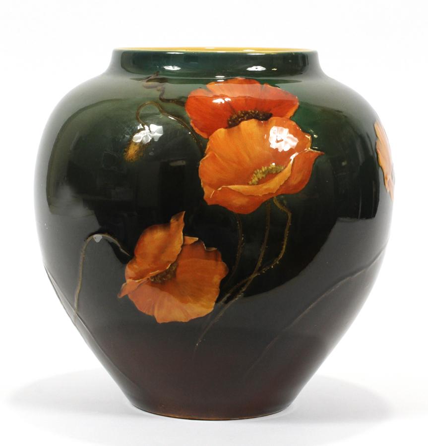 RUBEN EARL MENZEL, ROOKWOOD 'POPPY' POTTERY VASE: RUBEN EARL MENZEL, ROOKWOOD 'POPPY' POTTERY VASE, C. 1900, H 9.75", DIA 9" An early Rookwood Pottery vase by Ruben Earl Menzel (American, 1883-1971). Having a poppy design, this piece offers a rich ea