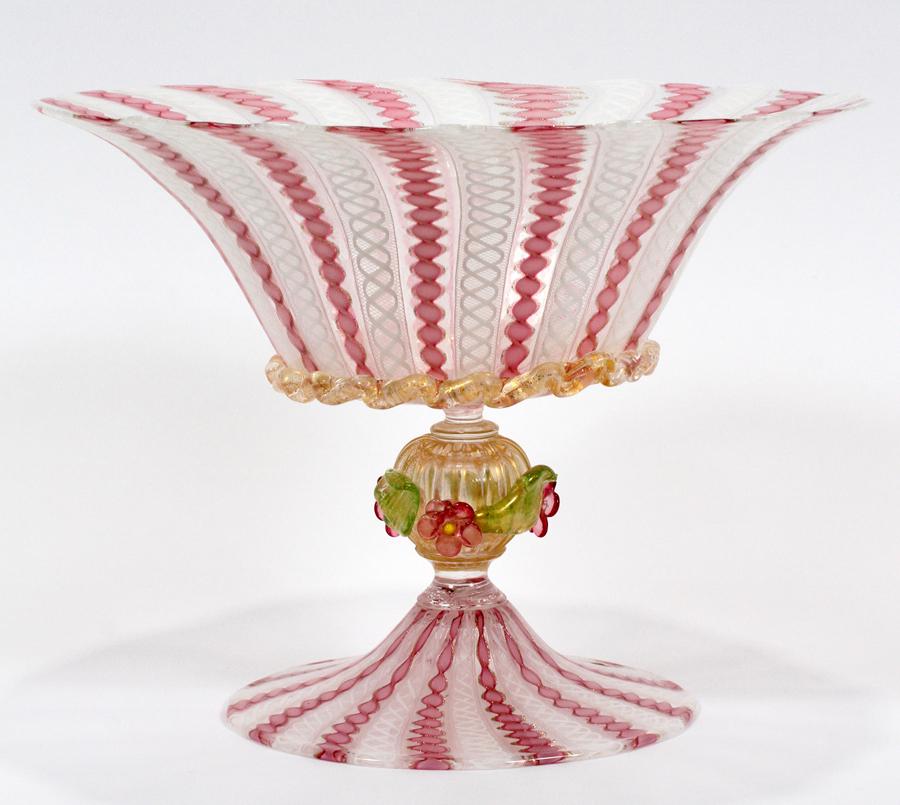 ZANRIFRICO CANED VENETIAN GLASS FOOTED BOWL: ZANRIFRICO CANED VENETIAN GLASS FOOTED BOWL H 9" DIA 12" A Venetian glass footed bowl with laticino caneing.